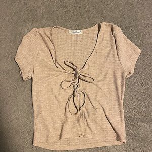 cute beige tie up crop top! 
size: SMALL
condition: like new